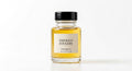 Emerald Fougère perfume oil concentrate in a glass bottle with black cap and cream label