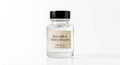Rice Milk & Cherry Blossom perfume oil concentrate in a clear glass bottle with black cap and cream label